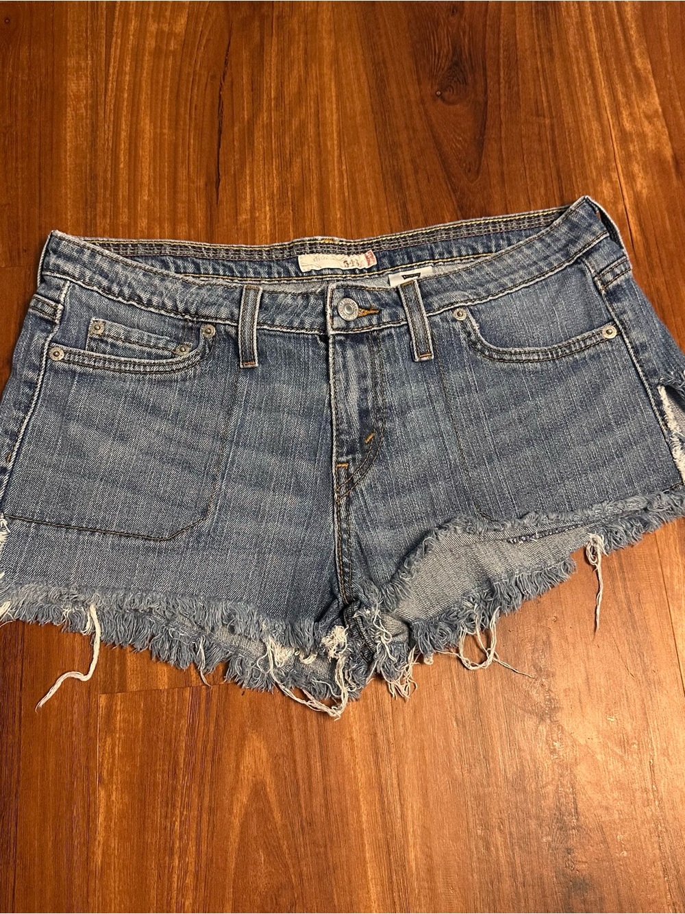 Levi's Light Blue Frayed Hem Denim Shorts